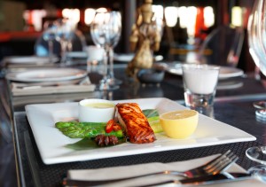 Asian style salmon steak on restaurant table